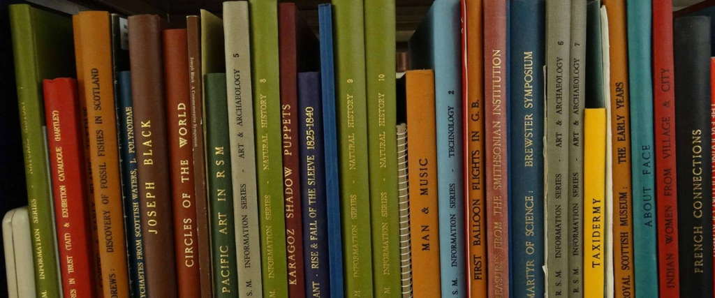 A stack of colourful books.